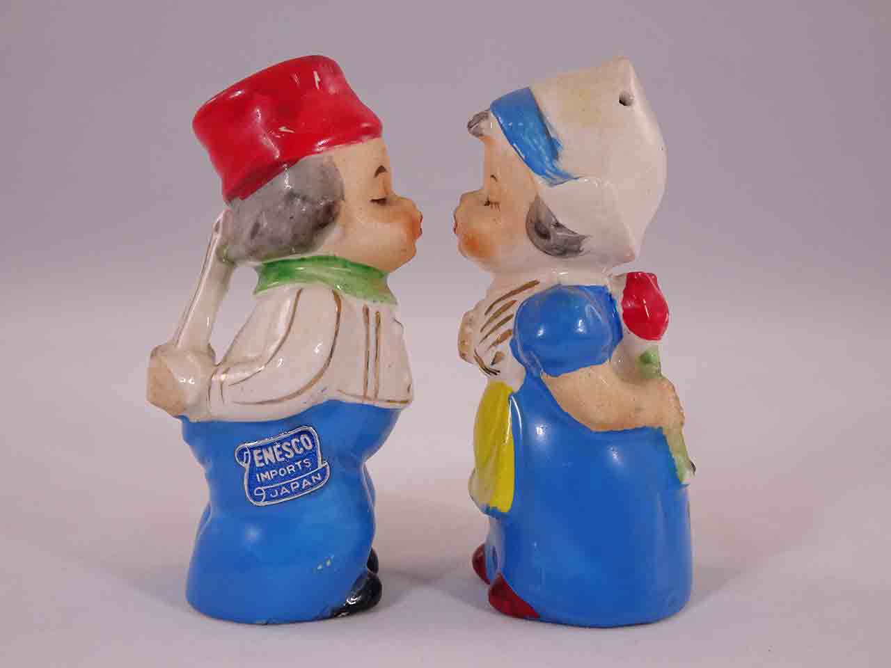 Kissing Dutch / Holland children holding objects behind their backs salt and pepper shakers