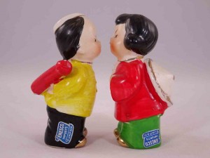 Kissing Japanese children holding objects behind their backs salt and pepper shakers