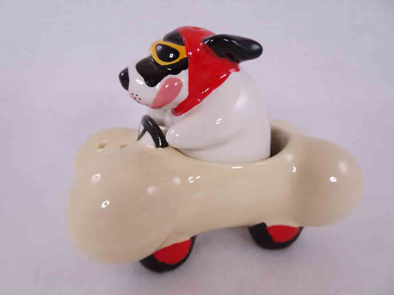 Clay Art salt and pepper shakers series of animals in funny race cars - dog in bone