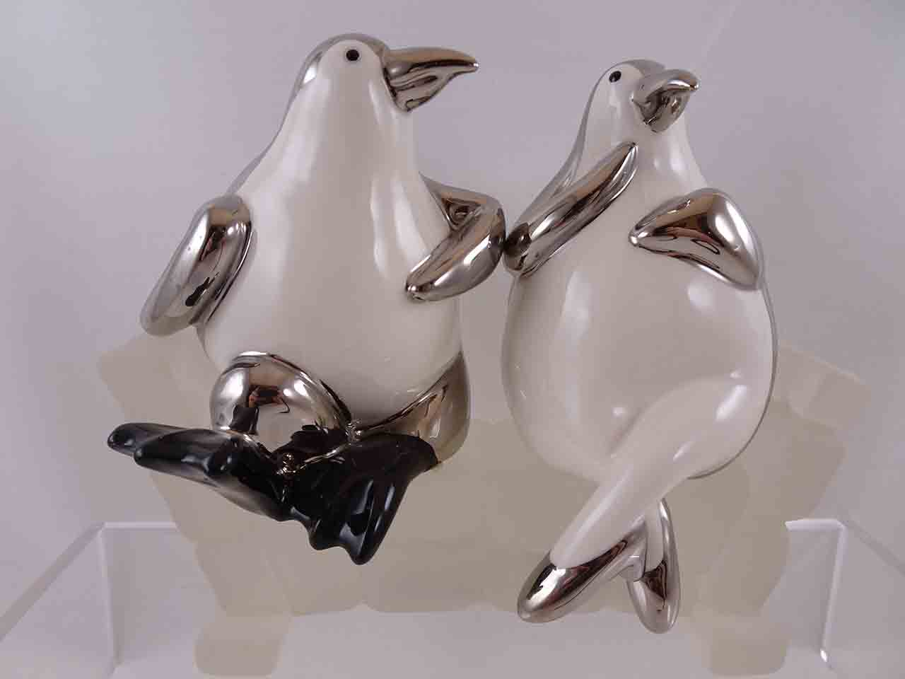 Department 56 penguins sitting on an ice bench salt and pepper shakers