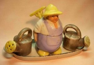 Gardner with watering cans condiment salt and pepper shakers