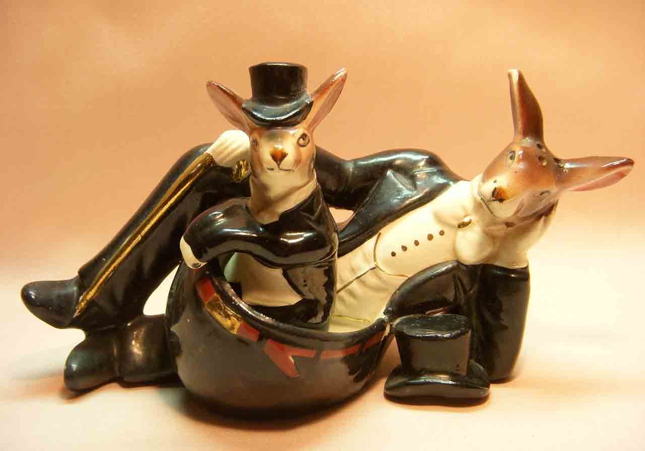 Nester kangaroo with joey nesting in pouch wearing tuxedos salt and pepper shaker