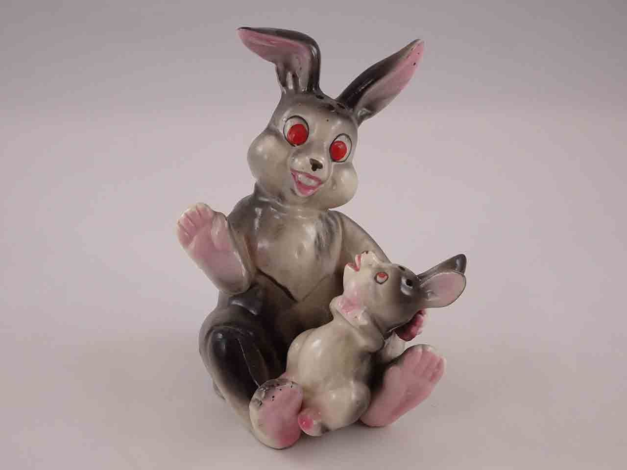 Mother rabbit holding bunny in lap salt and pepper shakers