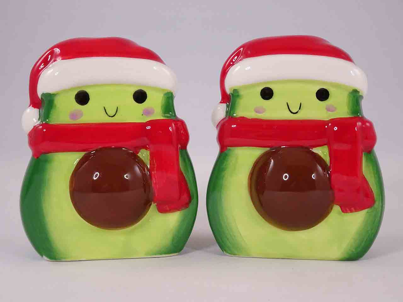 Christmas anthropomorphic avocado in Santa hats salt and pepper shakers