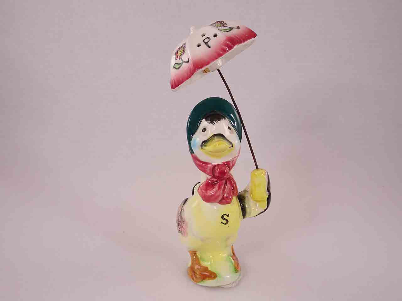 Duck holding umbrella salt and pepper shakers