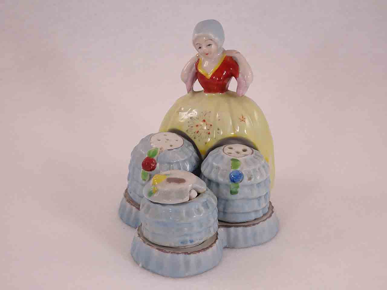 Occupied Japan condiment set and salt and pepper shakers - lady