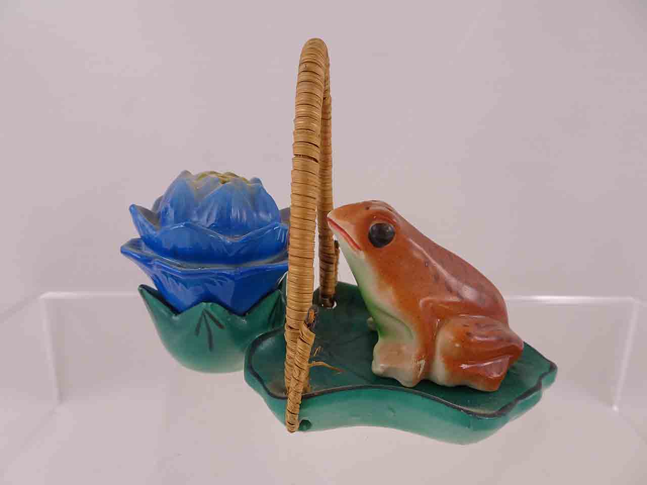 Frog with flower on lily pad with wicker handle salt and pepper shakers