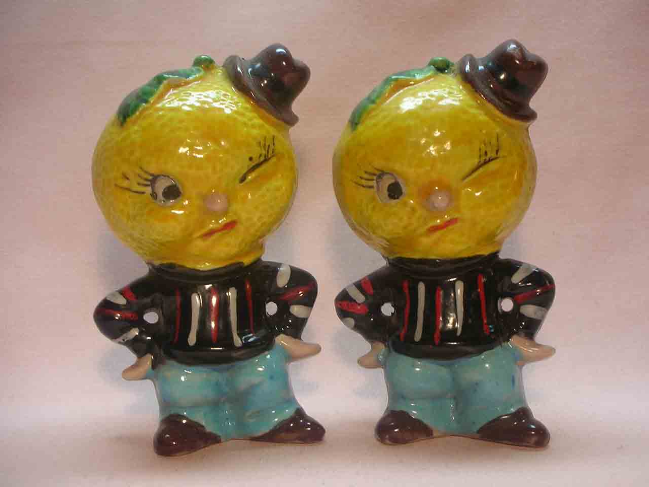 Anthropomorphic salt and pepper shakers called "2 of a Kind" - oranges
