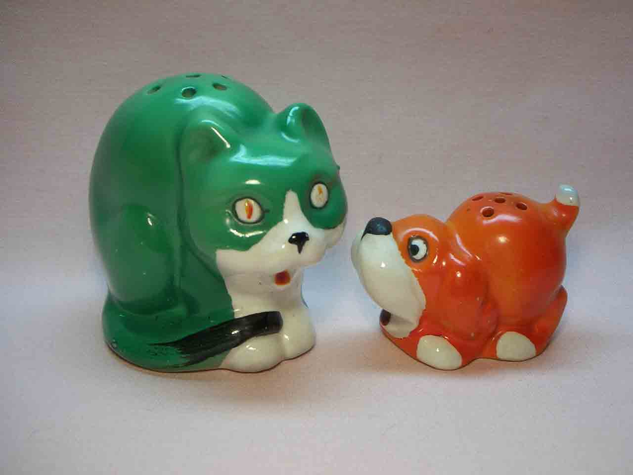 Large cat with small crouching dog Goebel salt and pepper shakers