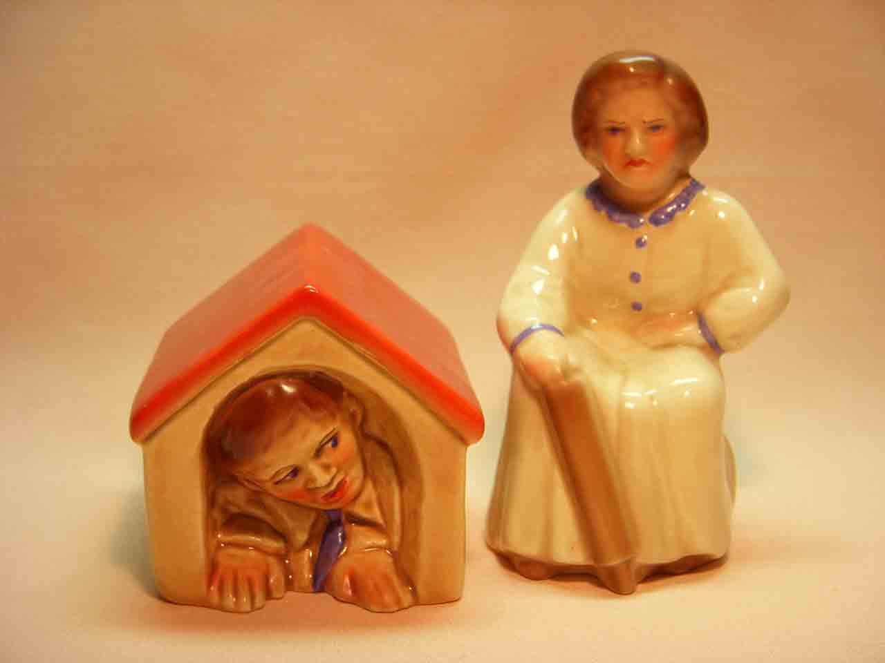 Vallona Starr man in doghouse with wife salt and pepper shakers